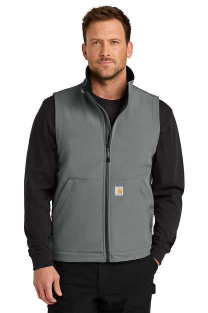 Man wearing a gray Carhartt vest over a black long-sleeve shirt on a white background embroidered Carhartt® Rain Defender® Soft Shell Vest