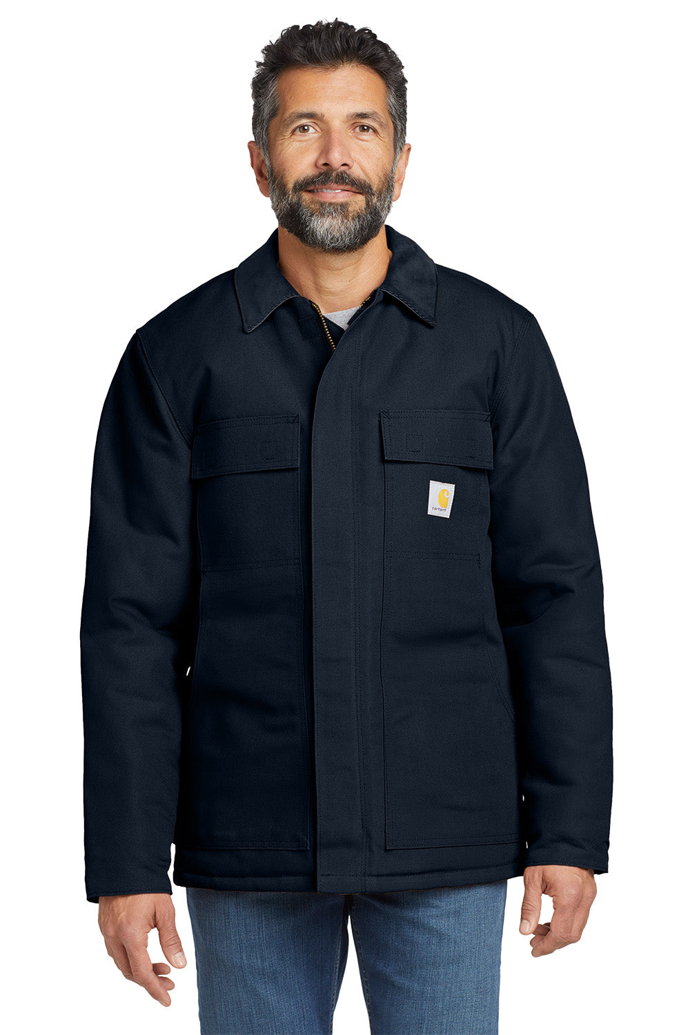Man wearing a black jacket with a visible brand logo on a white background embroidered Carhartt® Duck Traditional Coat
