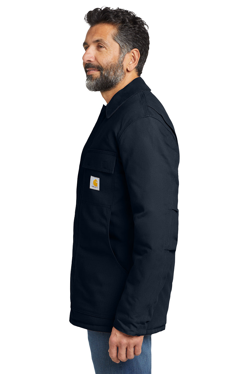 Man wearing a black jacket with a visible brand logo on a white background embroidered Carhartt® Duck Traditional Coat