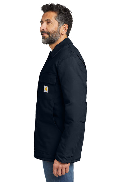 Man wearing a black jacket with a visible brand logo on a white background embroidered Carhartt® Duck Traditional Coat