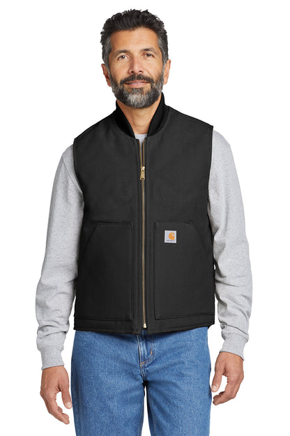 Man wearing a black vest over a gray shirt with a white background embroidered Carhartt® Duck Vest