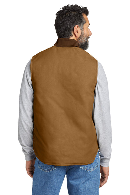 Man wearing a brown vest over a gray shirt with blue jeans on a white background embroidered Carhartt® Duck Vest