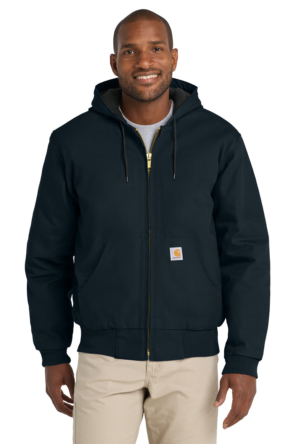 Man wearing a navy blue hoodie with a visible brand logo on a white background embroidered Carhartt® Quilted-Flannel-Lined Duck Active Jac