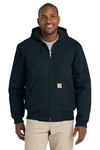Man wearing a navy blue hoodie with a visible brand logo on a white background embroidered Carhartt® Quilted-Flannel-Lined Duck Active Jac