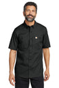 Man wearing a black short-sleeve shirt with Carhartt logo on a white background embroidered Carhartt® Rugged Professional™ Series Short Sleeve Shirt