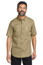 Man wearing a beige short-sleeve shirt with Carhartt logo on a white background embroidered Carhartt® Rugged Professional™ Series Short Sleeve Shirt