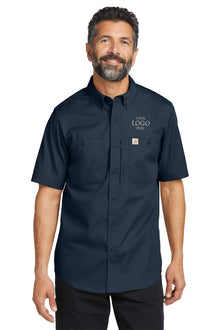 Man wearing a navy blue short-sleeve work shirt with customizable logo area on a white background embroidered Carhartt® Rugged Professional™ Series Short Sleeve Shirt