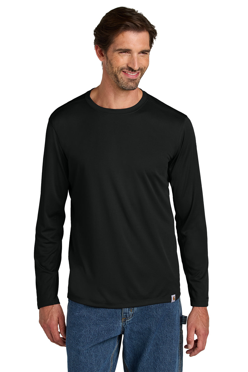 Man wearing a black long-sleeve shirt and blue jeans on a white background embroidered Carhartt Force® Sun Defender™ Long Sleeve Shirt