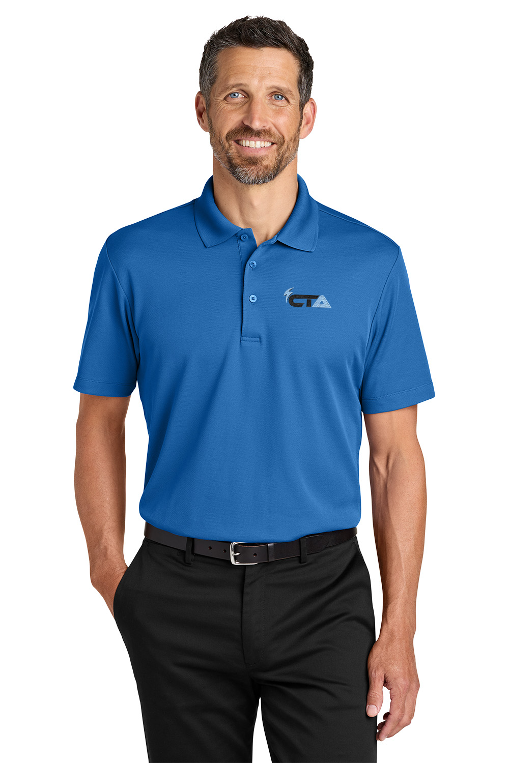 Man wearing a blue polo shirt and black pants on a white background. Port Authority® Plaited Pique Polo, Creative Technologies Academy embroidered by Helmsman Stitch Co.