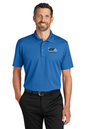 Man wearing a blue polo shirt with a logo on a white background. Port Authority® Plaited Pique Polo, Creative Technologies Academy embroidered by Helmsman Stitch Co.