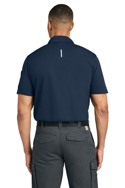 Person wearing a navy blue shirt and gray pants on a white background, Carhartt® FLD & RSCU Polo, Embroidered
