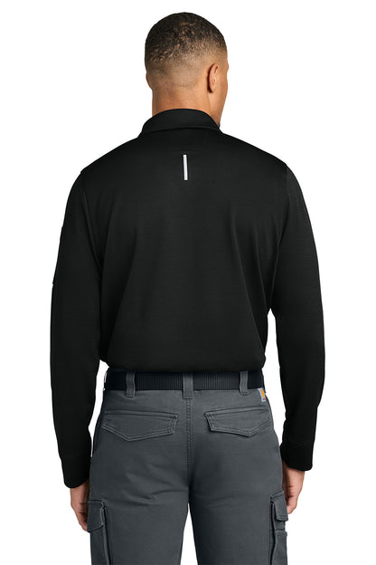 Person wearing a black long-sleeve shirt and gray pants on a white background, Carhartt® FLD & RSCU Long Sleeve Polo, Embroidered
