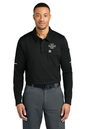 Man wearing a black long-sleeve polo shirt with a logo on a white background, Carhartt® FLD & RSCU Long Sleeve Polo, Embroidered