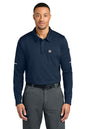 Man wearing a navy long-sleeve polo shirt with a logo on a white background, Carhartt® FLD & RSCU Long Sleeve Polo, Embroidered