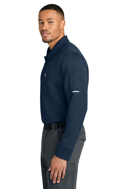 Man wearing a navy long-sleeve shirt and gray pants on a white background, Carhartt® FLD & RSCU Long Sleeve Polo, Embroidered