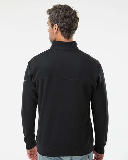 Man wearing a black jacket on a white background. Columbia Men's Hart Mountain™ II Half-Zip Pullover, Embroidered by Helmsman Stitch Co.