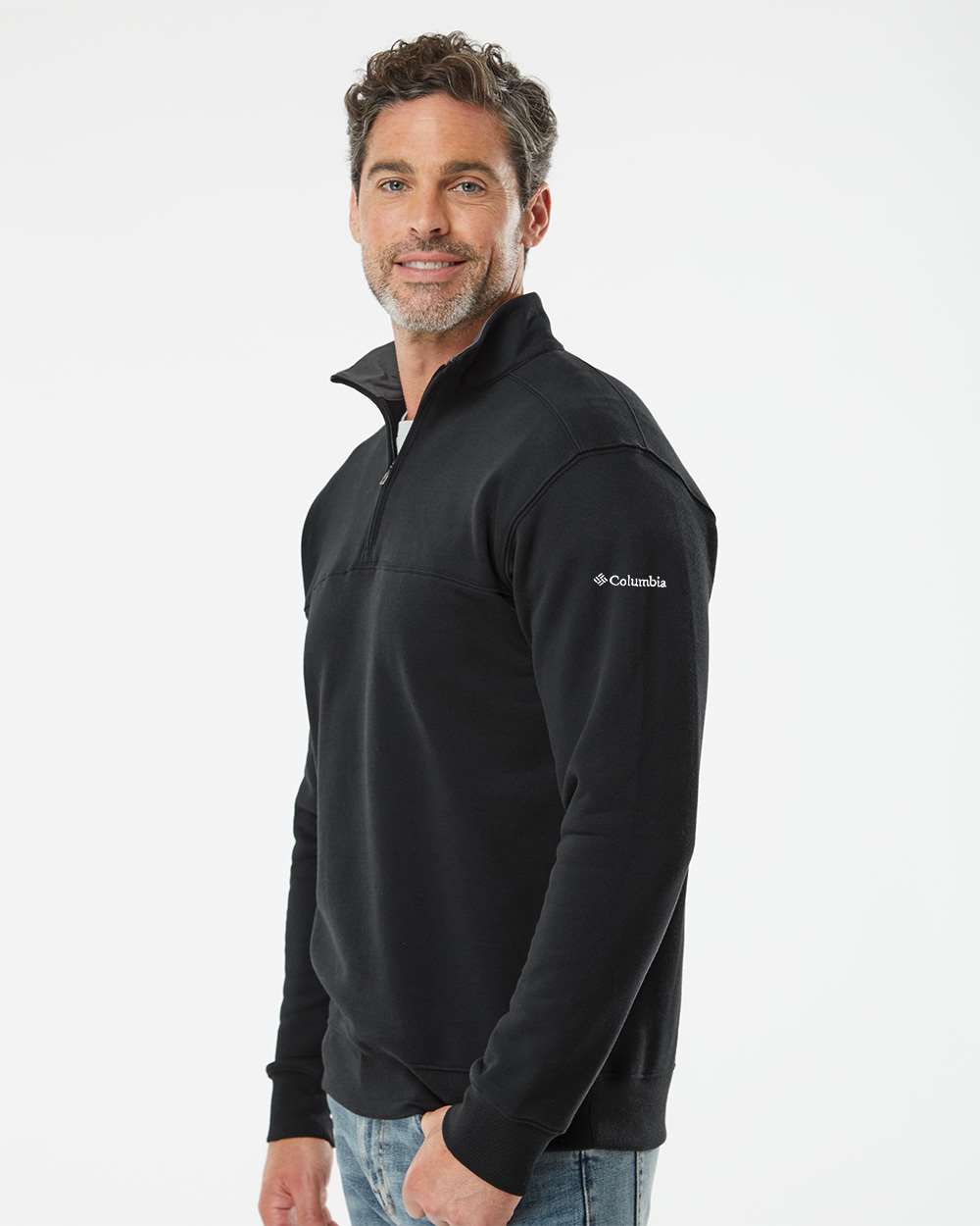 Man wearing a black Columbia half-zip sweatshirt on a white background. Columbia Men's Hart Mountain™ II Half-Zip Pullover, Embroidered by Helmsman Stitch Co.
