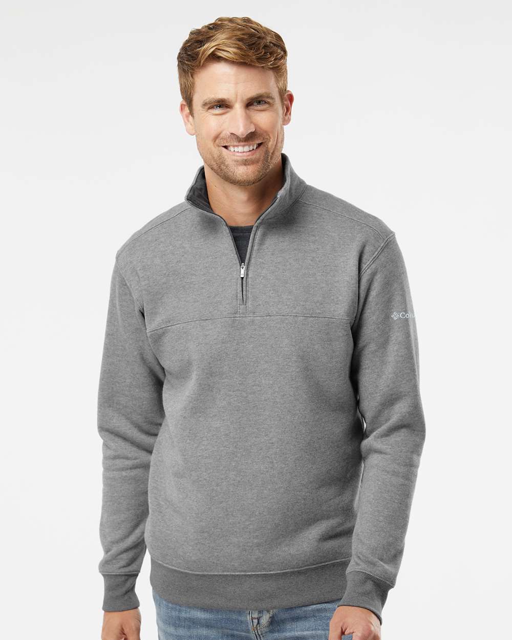 Man wearing a gray half-zip sweatshirt on a white background. Columbia Men's Hart Mountain™ II Half-Zip Pullover, Embroidered by Helmsman Stitch Co.