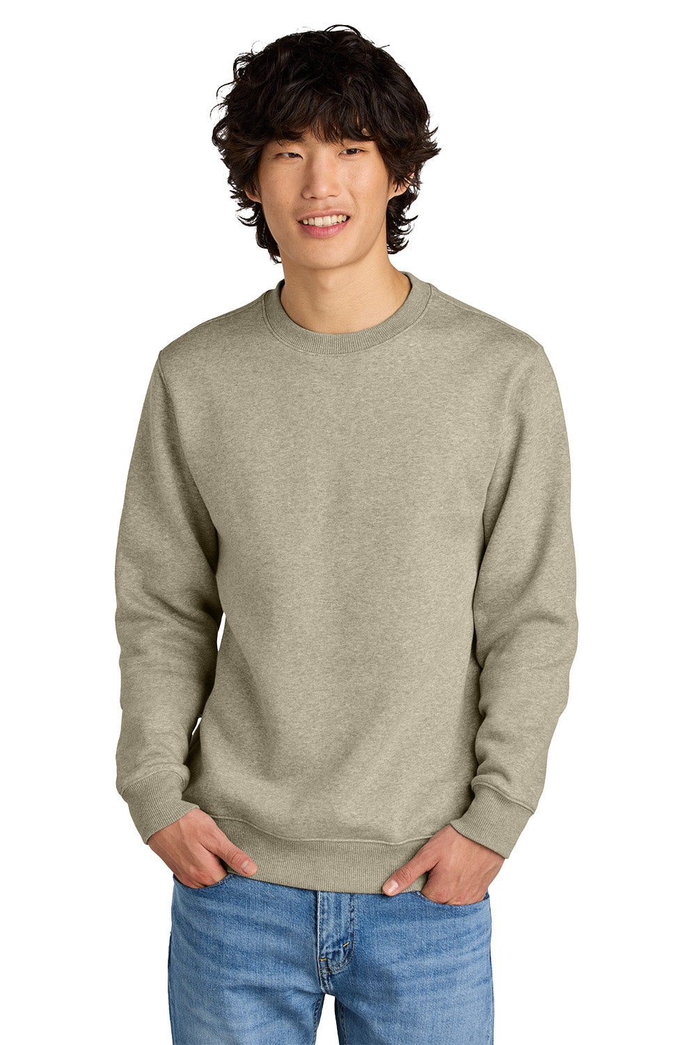 Man wearing a gray sweatshirt and blue jeans on a white background, Embroidered District® Perfect Weight® Fleece Crew