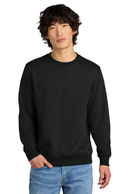 Person wearing a black sweatshirt and blue jeans on a white background, Embroidered District® Perfect Weight® Fleece Crew