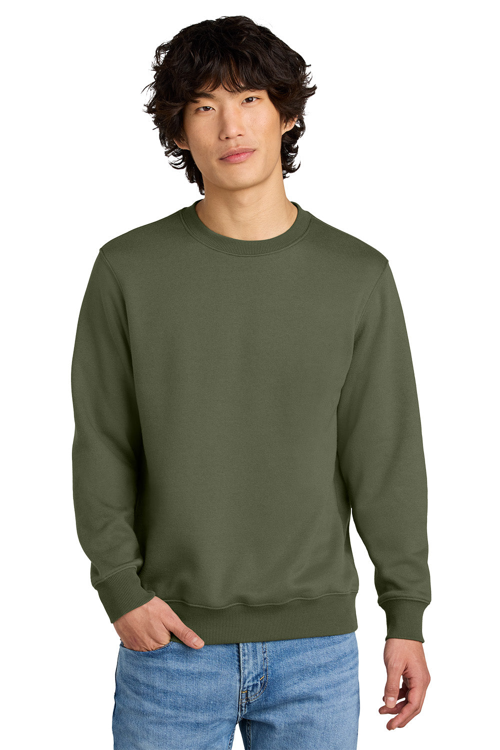 Man wearing an olive green sweatshirt and blue jeans on a white background, Embroidered District® Perfect Weight® Fleece Crew