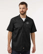Man wearing a black short-sleeve shirt on a white background. Dickie's Men's Shirt Sleeve Work Shirt, Embroidered by Helmsman Stitch Co.
