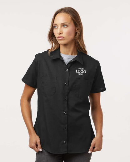 Woman wearing a black short-sleeve shirt with customizable logo text on a white background, Dickie's Women's Industrial Short Sleeve Work Shirt, Embroidered