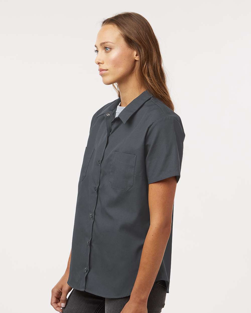Woman wearing a gray short-sleeve shirt on a white background, Dickie's Women's Industrial Short Sleeve Work Shirt, Embroidered