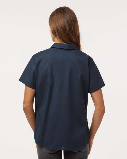 Person wearing a navy blue polo shirt on a white background, Dickie's Women's Industrial Short Sleeve Work Shirt, Embroidered