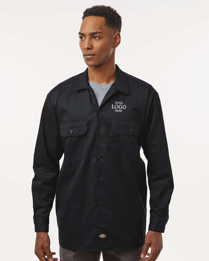 Man wearing a black shirt with 'NEW LOGO HERE' text on a white background. Dickie's Men's Long Sleeve Work Shirt, Embroidered by Helmsman Stitch Co.