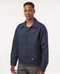 Man wearing a navy blue jacket on a white background. Dickie's Men's Unlined Industrial Eisenhower Jacket, Embroidered