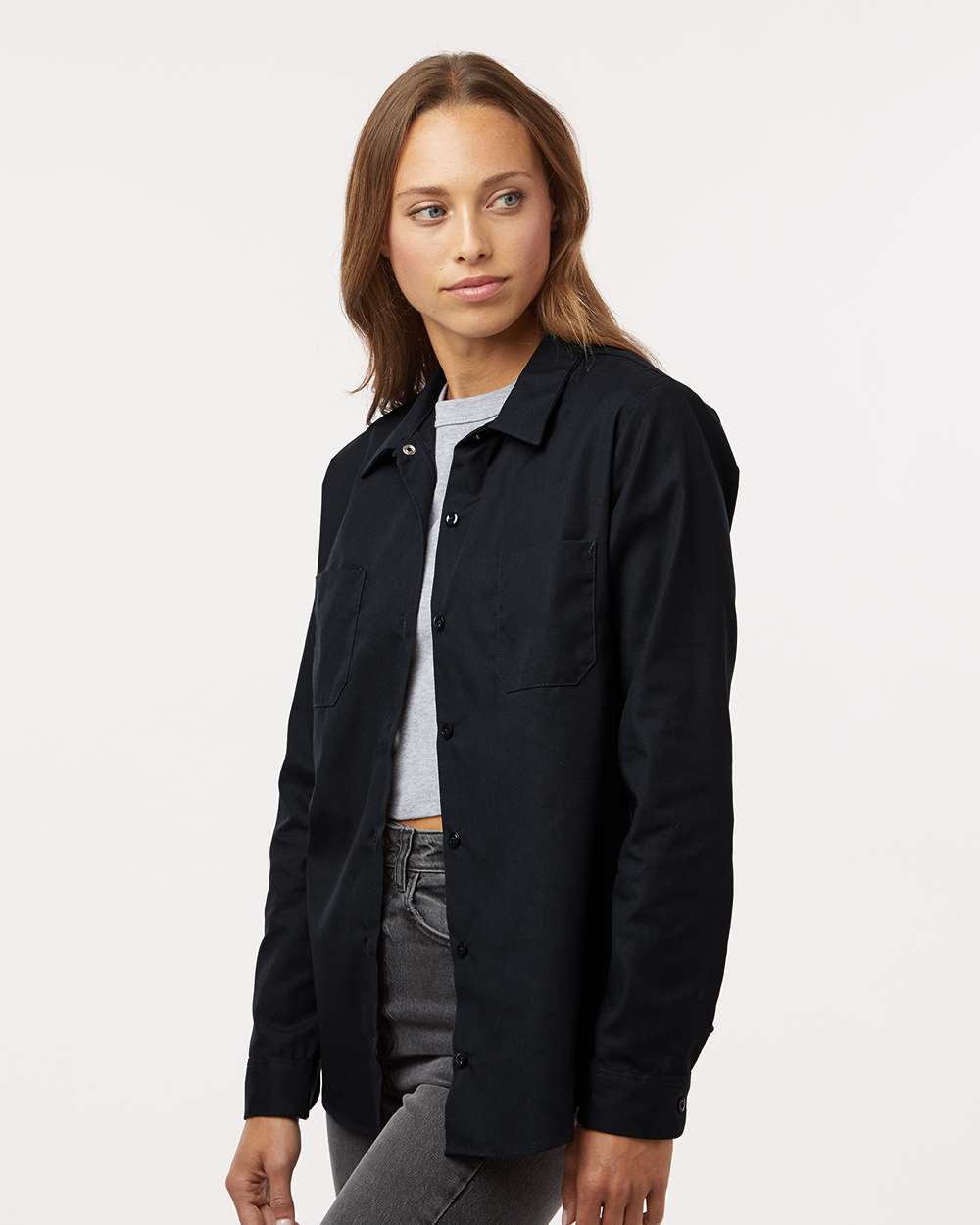 Woman wearing a black jacket on a white background, Dickie's Women's Industrial Long Sleeve Work Shirt, Embroidered