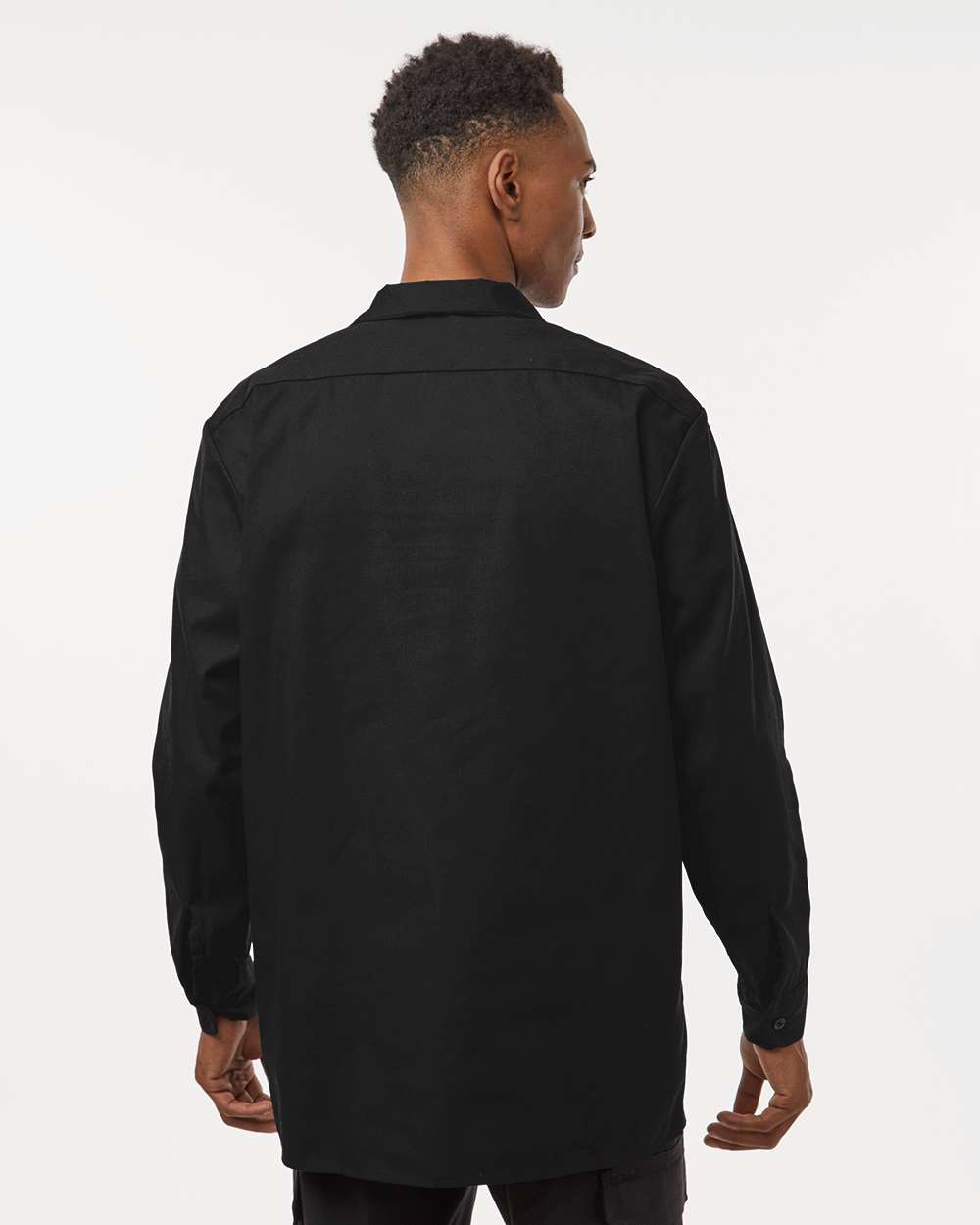 Person wearing a black shirt from behind on a white background. Dickie's Men's Industrial long Sleeve Work Shirt, Embroidered by Helmsman Stitch Co.