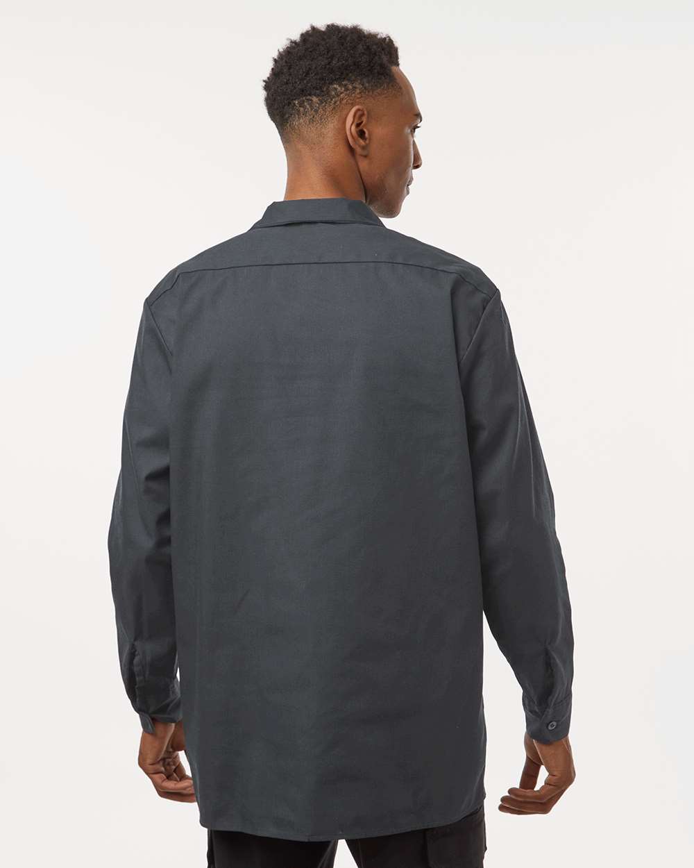 Man wearing a dark gray shirt against a white background. Dickie's Men's Industrial long Sleeve Work Shirt, Embroidered by Helmsman Stitch Co.