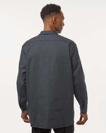 Man wearing a dark gray shirt against a white background. Dickie's Men's Industrial long Sleeve Work Shirt, Embroidered by Helmsman Stitch Co.