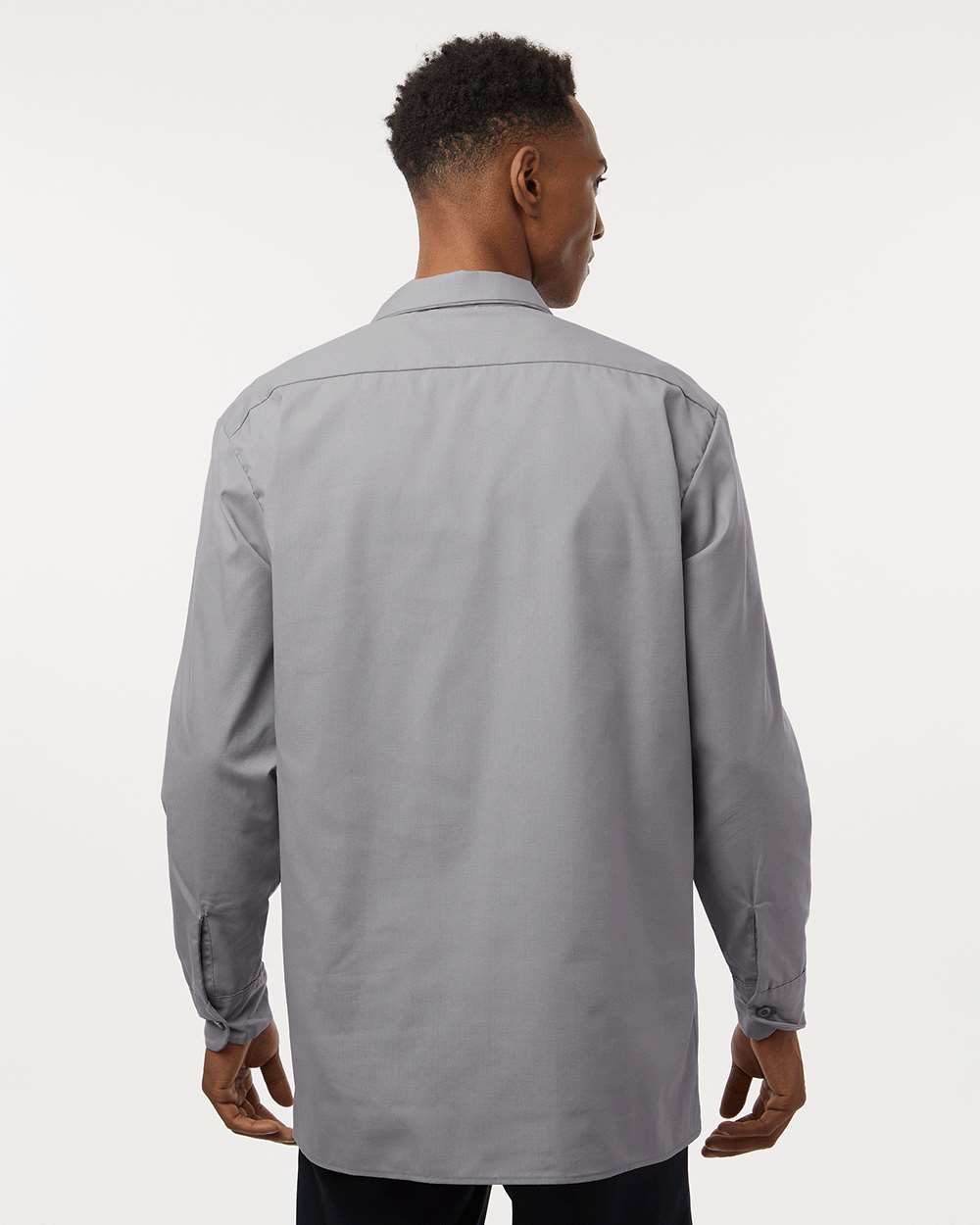 Man wearing a gray shirt against a white background. Dickie's Men's Industrial long Sleeve Work Shirt, Embroidered by Helmsman Stitch Co.