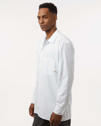 Man wearing a white lab coat on a plain background. Dickie's Men's Industrial long Sleeve Work Shirt, Embroidered by Helmsman Stitch Co.