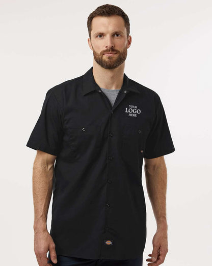 Man wearing a black short-sleeve shirt with a placeholder logo on a white background. Dickie's Men's Industrial Short Sleeve Work Shirt, Embroidered by Helmsman Stitch Co.