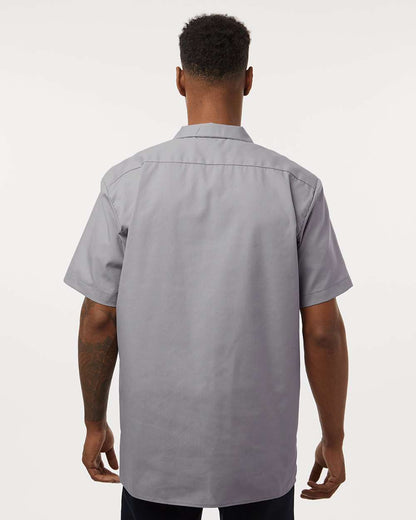 Man wearing a gray short-sleeve shirt on a white background. Dickie's Men's Industrial Short Sleeve Work Shirt, Embroidered by Helmsman Stitch Co.