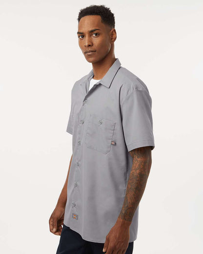 Man wearing a gray short-sleeve work shirt on a white background. Dickie's Men's Industrial Short Sleeve Work Shirt, Embroidered by Helmsman Stitch Co.