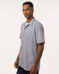 Man wearing a gray short-sleeve work shirt on a white background. Dickie's Men's Industrial Short Sleeve Work Shirt, Embroidered by Helmsman Stitch Co.