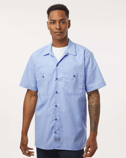 Man wearing a light blue short-sleeve button-up shirt on a white background. Dickie's Men's Industrial Short Sleeve Work Shirt, Embroidered by Helmsman Stitch Co.