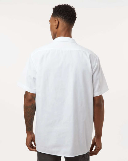 Man wearing a white short-sleeve shirt on a plain background. Dickie's Men's Industrial Short Sleeve Work Shirt, Embroidered by Helmsman Stitch Co.