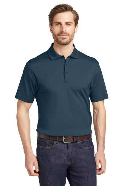 Man wearing a maroon polo shirt with a logo on a white background, Eddie Bauer® Performance Polo, Embroidered