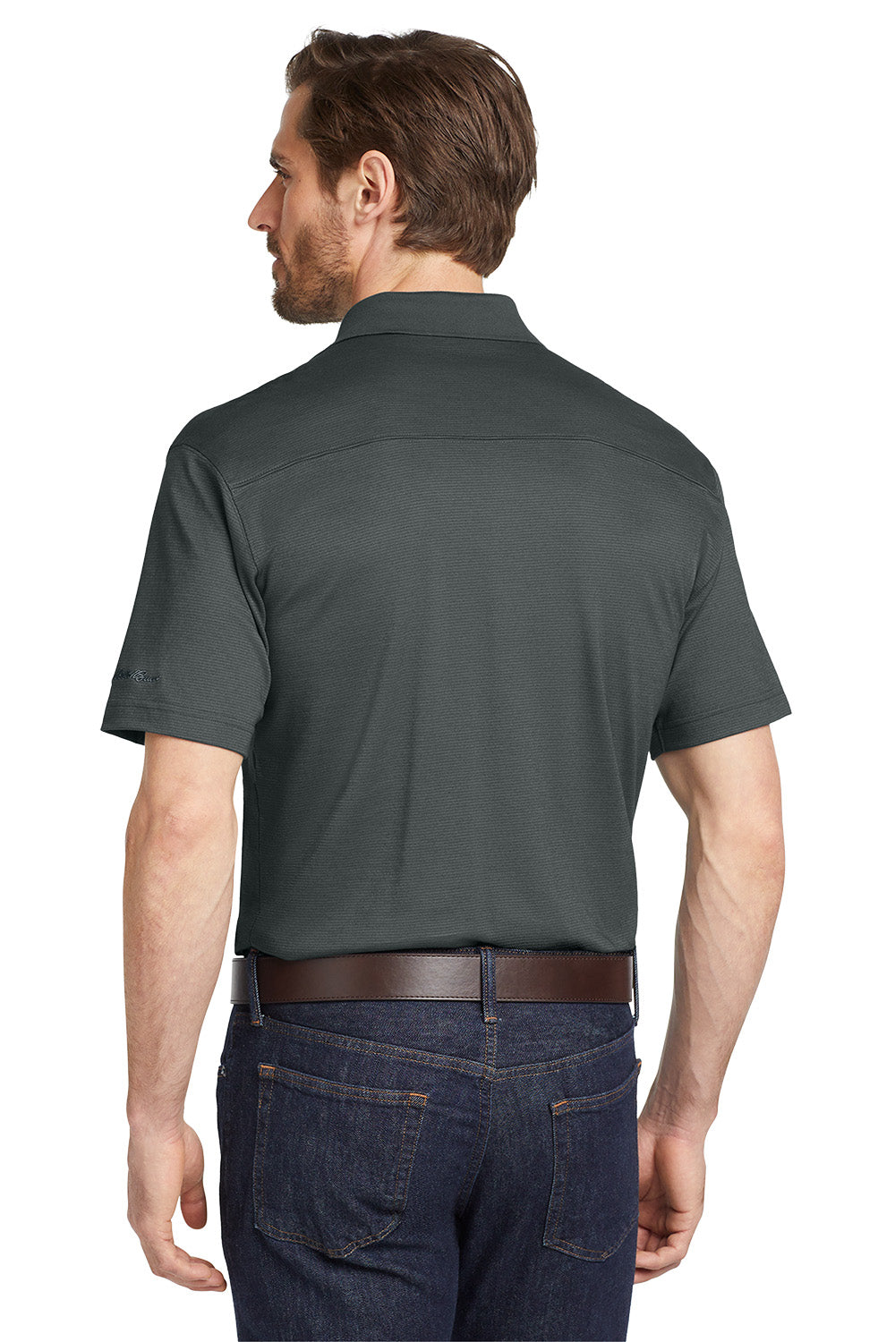 Man wearing a dark gray short-sleeve shirt and dark jeans on a white background, Eddie Bauer® Performance Polo, Embroidered