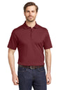 Man wearing a maroon polo shirt and blue jeans on a white background, Eddie Bauer® Performance Polo, Embroidered