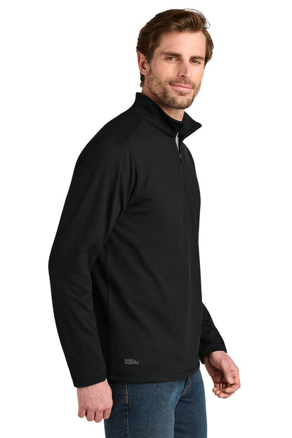 Man wearing a black pullover with a white background. Eddie Bauer® Adventurer 1/4-Zip, Embroidered