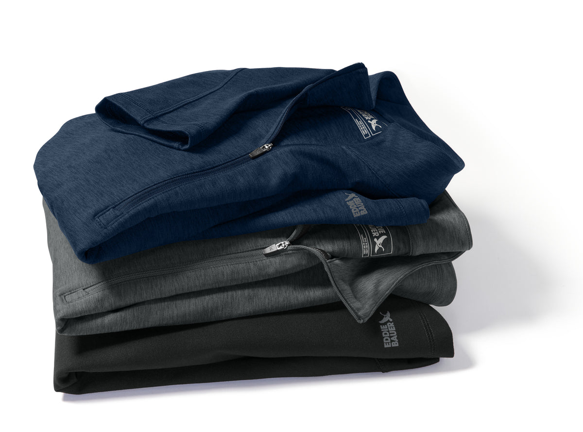 Stack of folded navy, gray, and black shirts on a white background. Eddie Bauer® Adventurer 1/4-Zip, Embroidered