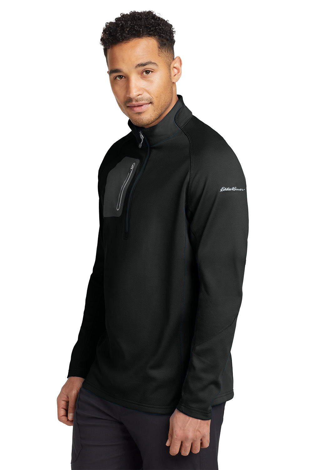 Man wearing a black pullover with a brand logo on a white background. Eddie Bauer® 1/2-Zip Performance Fleece, Embroidered