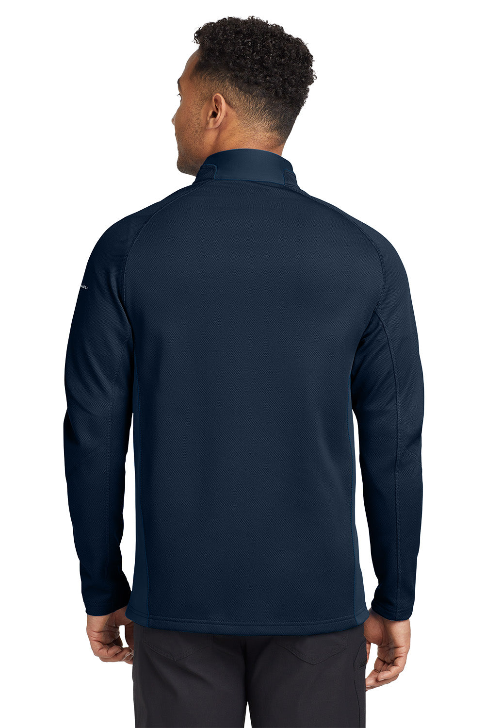 Person wearing a navy blue long-sleeve shirt on a white background. Eddie Bauer® 1/2-Zip Performance Fleece, Embroidered